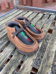 Your little one is sure to love these Ariat LIL’ STOMPERS toddler casual shoes by M&F Western Products. Soft and fashionable, and easy to get on and off. Super comfortable for all day wear. Full grain leather foot Ariat Shield and Logo Embroidered on the Tongue in Mexican Colors Brown Elastic Lacing Durable rubber outsoles Soft and fashionable Easy to get on and off Super comfortable for all day wear Mexican Colors, Western Store, Cowgirl Western, Colors Brown, Casual Shoe, M F, Logo Embroidered, Sperrys, Full Grain Leather