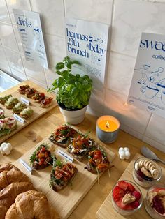 a table topped with lots of different types of food