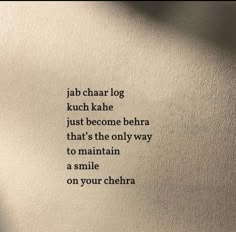 an image of a poem written in black ink on a white paper with the words jab chaar log kuch kahe just become belra that's the only way to maintain a smile on your cher