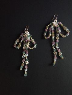 This is bow earrings made of seed beads, pearls and glass beads. They are neatly handwoven in feminine design. the all materials that I use are of the high quality (natural stones or first grade beads)  all pieces in my store are neatly handcrafted by me  ready to ship for 1-3 days worldwide free shipping (delivery time US -10-20 days, Europe 14-24days, other 14-30days)  I represent a small business and items are limited I use cute handmade eco tags made from recycled paper in the packaging, i Jewelry Y2k, Seed Bead Flowers, Earrings Bead, Gold Hooks, Pearl Bow, Women Aesthetic, Beaded Jewels, Dope Jewelry, Handmade Beaded Jewelry