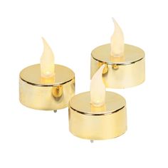 two gold candles sitting on top of each other