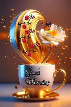 a cup with some flowers in it and the words good morning