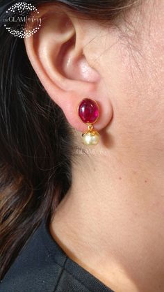 Lab created Ruby oval cabochon and pearl round drop earring pair. Made in guaranteed Silver 925 Real gold 18K filled for durability and finishing Size of ruby is 10 mm x 12 mm Size of pearl is 8 mm Ruby we have used is lab created but exact color and quality as real ruby. We use made in Italy push bar and post for comfortable and durable wearing. We use best quality of stones, material and finishing which gives our jewelry that real premium feel. Gold Filling is completely different from Gold Plating as gold filling contains 100% gold which does not go away easily and enhances the life and look of the jewelry. Customer satisfaction is our utmost priority, please rest assured you will get what you are paying for. 2 Grams Gold Earrings Designs, Pearl Bangles Gold, Stone Earrings Gold, Unique Wedding Earrings, Earrings With Stones, Small Earrings Gold, Pearl Earrings Designs, Simple Gold Earrings, Pearl Earrings Gold