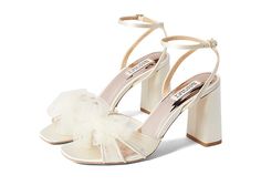 Badgley Mischka Tess - Women's Shoes : Ivory : Accented with a whimsical tulle bow on the vamp and lifted by an elegant block heel, the Badgley Mischka Tess Heels are enough to take your dressy style to new heights. Textile upper. Man-made lining and insole. Adjustable buckle strap closure on the ankle. Open square toe. Leather outsole. Imported. Measurements: Heel Height: 3 3 4 in Weight: 10 oz Product measurements were taken using size 9, width M. Please note that measurements may vary by size Open Toe Tulle Heels For Party, Tulle Open Toe Heels For Party, Elegant Formal Tulle Heels, Ankle Strap Tulle Heels For Parties, Tulle Ankle Strap Heels For Party, Spring Prom Block Heels With Heel Strap, Elegant Bow Block Heels For Spring, Formal Bow Straps Block Heels, Elegant Spring Block Heels With Bow