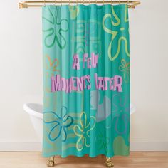 a shower curtain with the words fun moments later written on it in pink and blue