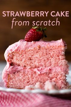 a slice of strawberry cake on a plate with the words strawberry cake made with real strawberries