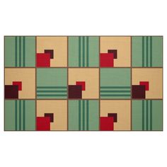 an area rug with squares and rectangles in green, brown, red and beige colors