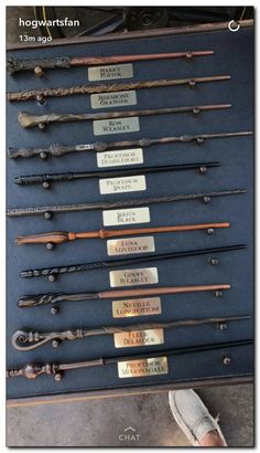 a display case filled with lots of different types of arrows