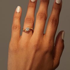 Two tiny, perfectly formed hands work together to hold a diamond. A romantic gesture of a ring that doubles as a small work of art. From the bench of master jeweler Anthony Lent, who studied the grand traditions of goldsmithing in Europe.�See Details for item specifics (carat weight, metal, etc).Financing options available in partnership with�Affirm. Cupping Hands, Anthony Lent, Claw Jewelry, Stacked Engagement Ring, Engagement Nails, Hand Rings, Diamond Signet Ring, Pearl And Diamond Necklace, Best Engagement Rings