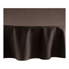 a black table cloth on top of a white table with a brown cover over it