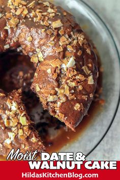 a chocolate doughnut with nuts on top