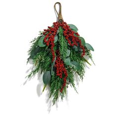 a bunch of red berries and green leaves hanging from a hook