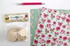 the contents of a craft kit including buttons and paper