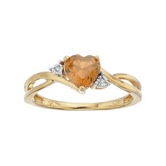 A heart-shaped citrine gemstone serves as the focal point to this beautiful ring, while shimmering diamond accents add eye-catching style.RING DETAILSWidth: 6.5 mmMetal: 10k goldPackaging: boxedSTONE DETAILSStone type: citrineTotal weight: 5/8 ct.Center stone size: 6 mmShape: heartSetting: prongDIAMOND DETAILSTotal weight: less than 1/10 ct.Shape: single cutSetting: illusionGemstones may have been treated to enhance their appearance. Special care may be required. Please visit our Gemstone Treatm Orange Rings, Promise Rings Simple, Citrine Ring Engagement, Orange Ring, Yellow Gems, Right Hand Rings, Citrine Ring, Citrine Gemstone, Onyx Ring