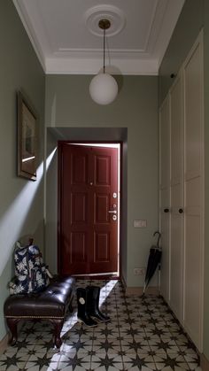 the hallway is clean and ready to be used as a place for someone to sit