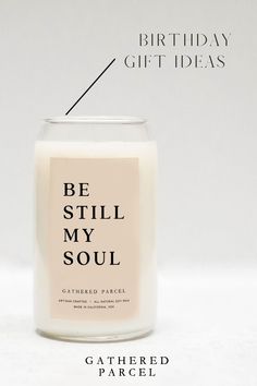 a candle with the words be still my soul written on it and an image of a candle