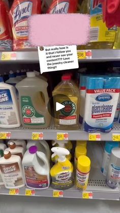 a shelf filled with cleaning products and detergents next to a pink sign that says, just really know what it is