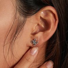 A pair of realistic detailed spider stud earrings that will make a unique statement on your everyday outfit. Add these cute spider earrings to your everyday fine jewelry collection or as gift for your love one. Add a touch of whimsy and edginess to your everyday look with these stunning spider stud earrings. These intricate and realistic spider charms will make a statement that is both bold and unique, whether you're dressing up or keeping it casual. Treat yourself or give the perfect gift to a Cute Spider, Spider Earrings, Sterling Silver Stud Earrings, For Your Love, Silver Stud Earrings, Everyday Outfit, Fine Jewelry Collection, Sterling Silver Studs, Sterling Silver Earrings Studs