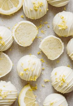 lemon meringue truffles with white frosting and yellow sprinkles