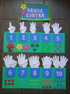 the numbers and hands are made out of paper