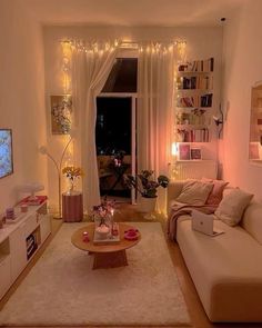 a living room filled with furniture and a flat screen tv