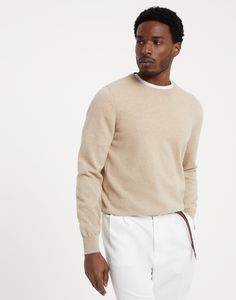 Cashmere sweater A timeless classic, this pure cashmere sweater represents an icon of the Brunello Cucinelli collections. The natural cashmere fiber’s superior quality enhances its comfortable fit, which is both lightweight and cozy. The contrast color edges of the cuffs and the inside of the crew-neck complete the style of this garment with refined details. Cream Cashmere Sweater With Ribbed Cuffs, Cream Long Sleeve Cashmere Sweater, Classic Cashmere Sweater With Ribbed Collar, Luxury Cashmere Tops With Ribbed Cuffs, Luxury Beige Sweater For Fall, Classic Wool Polo Sweater With Crew Neck, Classic Wool Crew Neck Polo Sweater, Luxury Crew Neck Merino Wool Sweater, Luxury Merino Wool Crew Neck Sweater