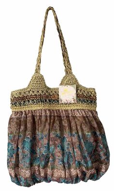 NWT Cappelli Straworld shoulder bag. The multicolored bohemian pattern and woven raffia and fabric exterior. The snap closure and shoulder strap handle style provide convenience and comfort, while the interior and exterior pockets offer ample storage space. The bag is made of a cotton blend and straw material, with a fabric lining in a light brown color. Multi Colored Bag, Light Brown Color, Bohemian Pattern, Small Boho, Woven Raffia, Beach Travel, Boho Bag, Small Bag, Beach Trip