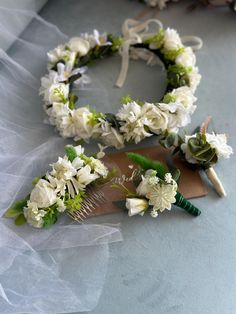 This wedding flower crown is the perfect boho-inspired hair accessory for brides and bridesmaids at a destination wedding. This beautifully crafted faux flower headpiece adds a touch of natural elegance, making it a stunning choice for any bridal look. Designed for adult women, this floral comb offers a charming blend of romantic and whimsical style, ideal for creating a dreamy, unforgettable wedding day. 🥀 Materials:  Artificial flowers, artificial greenery. 📐Dimensions: Boutonniere type A - W: 3.1 inches (8cm); H: 3.9 inches (10cm) Boutonniere type B - W: 3.1 inches (8cm); H: 3.9 inches (10cm) Hair comb - W: 5.1 inch (13 cm) All bridal accessories is meticulously handcrafted using premium flowers, greenery, and adorned with a velvet ribbon. Explore our collection, which includes elegan Wedding Flower Headpiece, Destination Wedding Hair, Hair Accessories For Bride, Accessories For Bride, Flower Headpiece Wedding, Wedding Flower Crown, Boho Wedding Flowers, Floral Comb, Whimsical Style