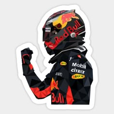 a man in a racing suit holding his fist up to the side while wearing a red bull helmet