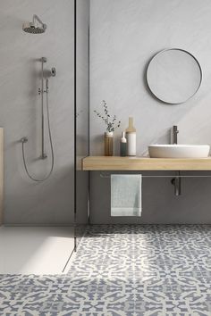 a bathroom with two sinks and a shower