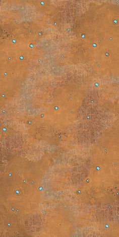 an orange and brown wall with blue dots on it