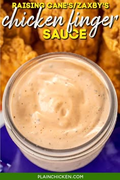 chicken fingers sauce in a glass jar with the text raising cane's laxy's chicken finger sauce