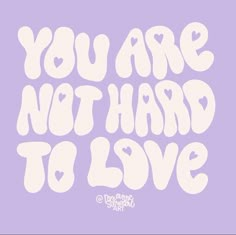 the words you are not hard to love written in white on a purple background with hearts