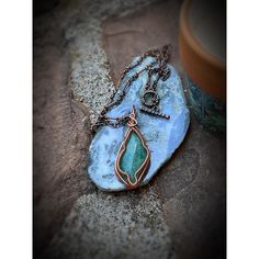 Hand Crafted Artisan Wire Wrap Jewelry By Baileysjewelry -Wireweaveduniques This Copper Wire Wrap Pendant Is Quite The Unique Piece. The Stone Is A Beautiful Blue Amazonite Crystal From Brazil. The Wire Weaved Bezel Is Intricate Showing The Shape Of A Leaf. Tarnish Resistant Copper Wire Is Framing This Gorgeous Shaped Amazonite Gemstone. This Boho Style Wire Wrap Pendant Would Be An Excellent And Unique Addition To Your Jewelry Stash. Dimensions: 2" Tall .75" Wide .25" Thick Weight: 7.9 Grams Ca Amazonite Crystal, Artisan Jewelry Handmade, Wire Wrap Jewelry, Wire Wrap Pendant, Amazonite Stone, Wrap Jewelry, Leaf Jewelry, Copper Pendant, Copper Chain