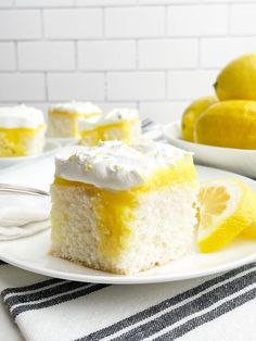 lemon pudding poke cake on a white plate