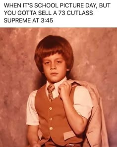 a young boy wearing a vest and tie standing in front of a wall with the caption, when it's school picture day, but you got a sell a 73 cutlass supreme at 3