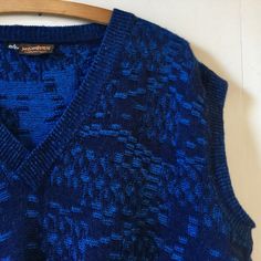 "Gorgeous vintage 80s Yves Saint Laurent sleeveless sweater tank. In all things blue. It's like a petrol blue running through it which gives it such a depth of colour. Made from wool and acrylic condition is used but very good. No snags or pulls found. It's a real gem. Size wise it states L and measures a 50\" chest. We do accept returns but only if the item has been grossly misdescribed and not because you have a change of mind or you have not checked measurements carefully we're afraid. Any questions please ask. Many thanks" All Things Blue, Vintage Yves Saint Laurent, Petrol Blue, Sweater Tank, Sleeveless Sweater, Sweater Outfits, Yves Saint Laurent, Saint Laurent, Adult Outfits