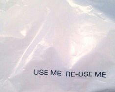 a white bag with the words use me re - use me on it