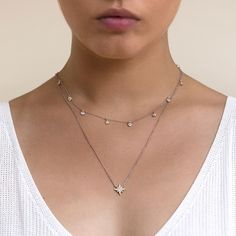 A sparkly pairing, This layered duo consists of two popular Sterling Silver necklace styles. Mix and match with our patented design. Crystal Diameter 4mm Adjustable chain: 13-16in (33-40cm), 15-18in (38-46cm) Starburst Necklace Pendant: Height 11mm x Width 11mm Adjustable chain: 15-17in (38-43cm) .925 Sterling Silver Cubic Zirconia Hypoallergenic, lead and nickel free #154S-379S Sparkling Star Necklace, Necklace Styles, Starburst Necklace, Layered Choker Necklace, Layered Necklace Set, Multi Strand Necklace, Strand Necklace, Sterling Silver Necklace, Mix And Match