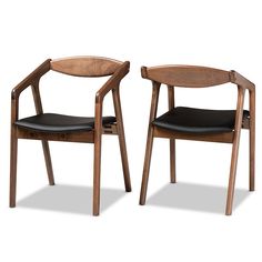 two wooden chairs side by side with black leather seat covers on them, one in the shape of a chair