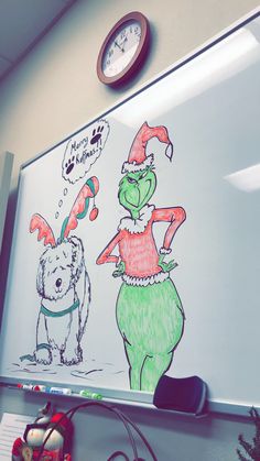 a drawing of a cat in the hat and a dog wearing santa's hats