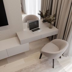 a laptop computer sitting on top of a white desk next to a chair and window