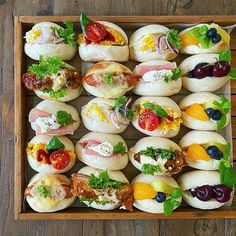 a basket filled with lots of different types of food on top of a wooden table