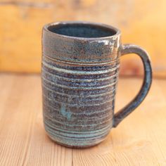 this handmade ceramic is made from a rich brown clay and layers several glazes to give a dynamic, funky look to the ridges of the mug. it is 4.75" tall and 3.75" wide, holding 14oz Ceramic Beer Mug, Funky Mug, Brown Clay, Pottery Mugs, Handmade Pottery, Handmade Ceramic, Beer Mug, Handmade Ceramics, Halloween Shopping