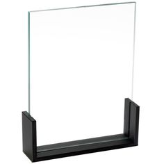 a glass and black shelf with a white background