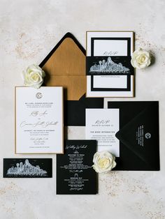 black and white wedding stationery with gold accents