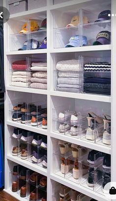 an organized closet with clear bins filled with shoes