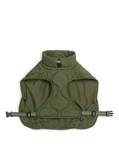 a green vest with two metal handles on the front and one has an attached handle