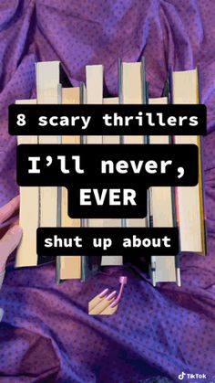 someone is holding an open book with the words 8 scary thrillers i'll never ever shut up about