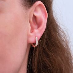 These delicate earrings can add the perfect amount of style flair to any summer outfit! Get yours today and create new trends all season long. Metal: 925 sterling silver (18K rose gold-plated) Measurements: 1.4 x 1.2 cm / 0.5 x 0.4" Stones: cubic zirconia Fastening: latch back Hypoallergenic: nickel-free materials used therefore suitable for those with metal allergies Trendy Cubic Zirconia Huggie Earrings, Rose Gold Minimalist Diamond Earrings For Pierced Ears, Everyday Rose Gold Huggie Earrings, Minimalist Rose Gold Diamond Drop Earrings, Trendy Hypoallergenic Rose Gold Earrings, Rose Gold Hypoallergenic Drop Diamond Earrings, Dainty Rose Gold Huggie Diamond Earrings, Everyday Rose Gold Huggie Diamond Earrings, Minimalist Rose Gold Hypoallergenic Diamond Earrings